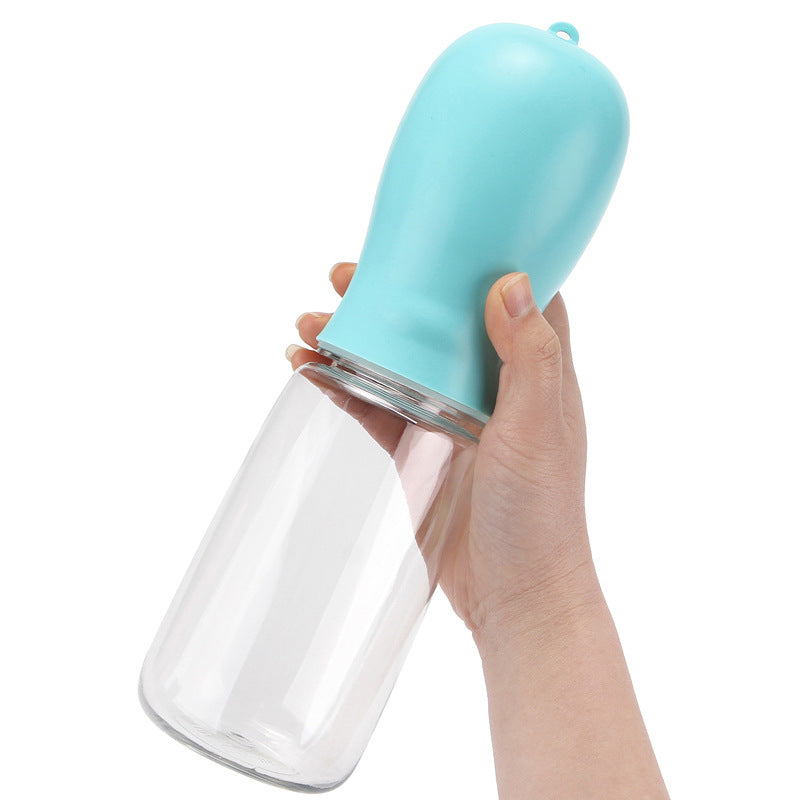Leakproof dog walking water bottle in Lake Green 550ml, in a home setting