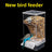 Anti splash cage mounted parrot feeder box in clear plastic, view 1