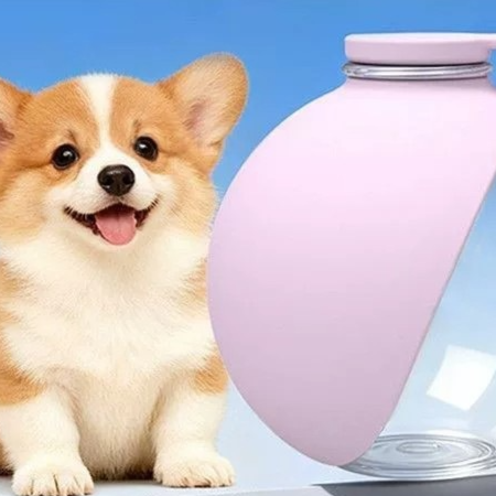 Silicone dog travel water bottle with ball outlet in Pink, close-up detail