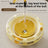 Self-Spinning Cat Turntable Toy with Feather Attachments and Weighted Tumbler Base