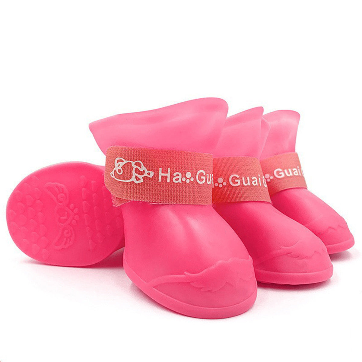 Waterproof silicone dog rain boots with non-slip soles in Pink, front view