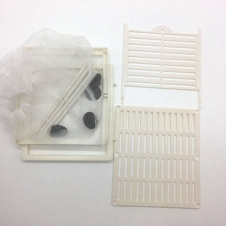 Mesh fish breeding isolation box with suction cups in aquarium, view 3