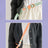 Wipe clean dog lead shown in purple, yellow and green