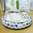 Round straw mat cooling pet nest with cat print, product image 1