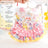Small dog wearing a pink cotton princess dress