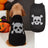 Orange pumpkin print knitted jumper on a small dog