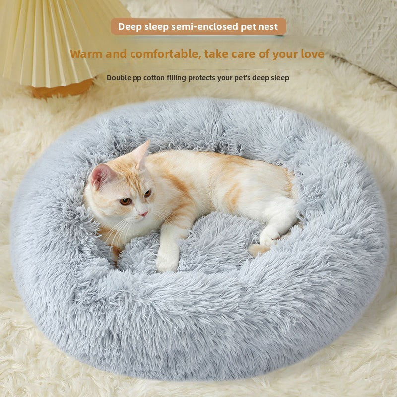 Plush round padded dog and cat bed, shown in 38 colours and styles