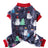 Coral fleece four-leg dog jumpsuit with holiday print, in a home setting