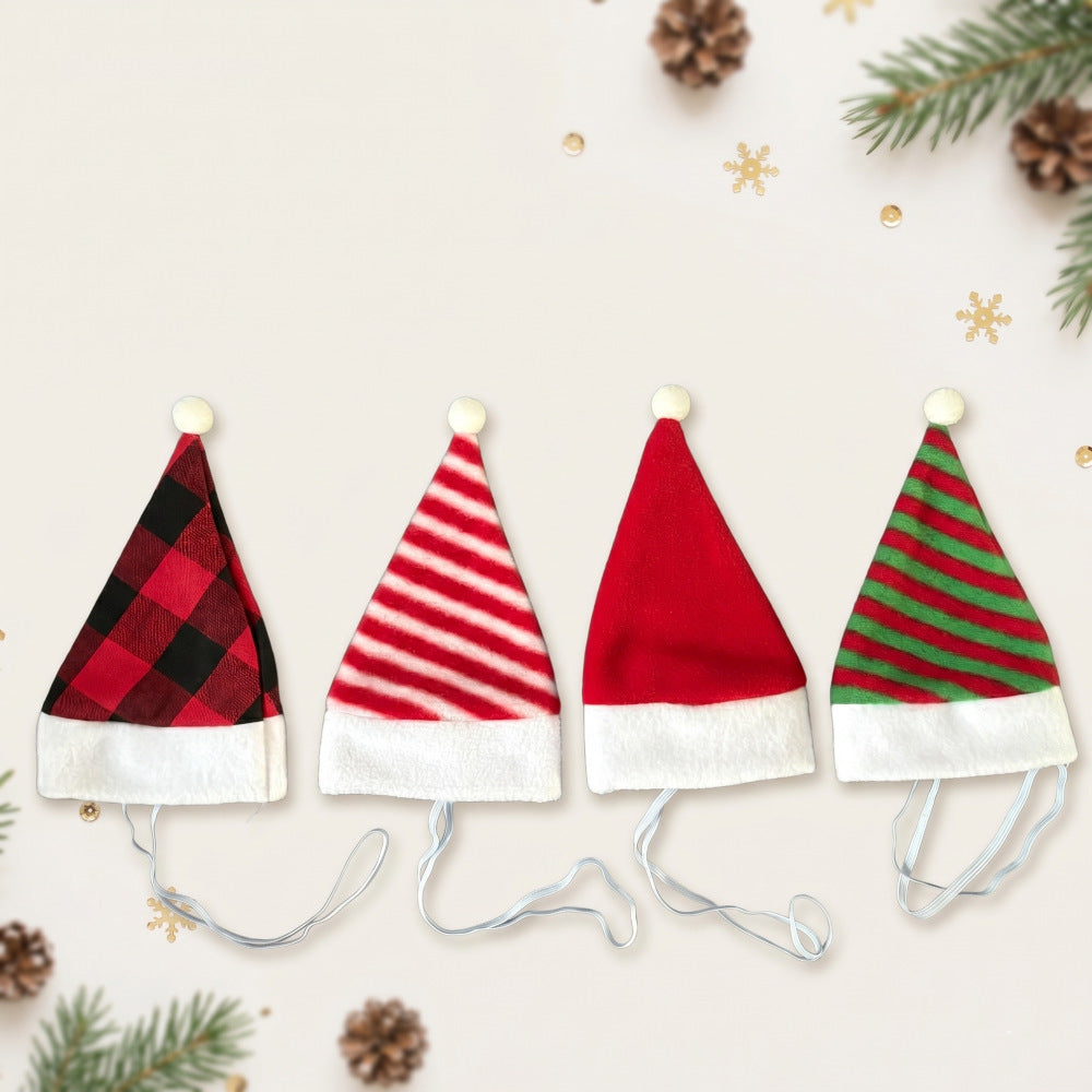 Cat wearing a plush red and white striped Christmas hat