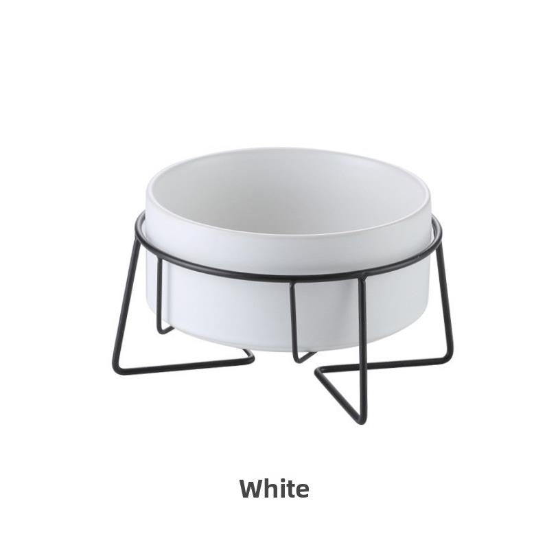 Raised glazed ceramic pet bowl on a stand in pastel yellow, view 17