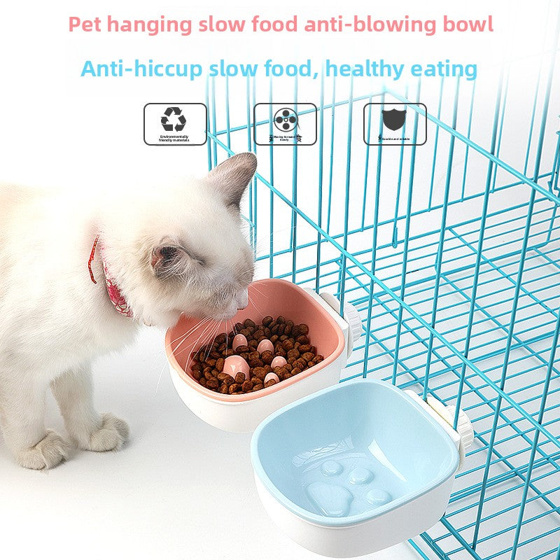 Blue hanging slow feeder pet bowl clipped to a crate, photo 2