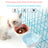Blue hanging slow feeder pet bowl clipped to a crate, photo 2