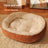 Oval wool blend pet nest bed in grey with cushion