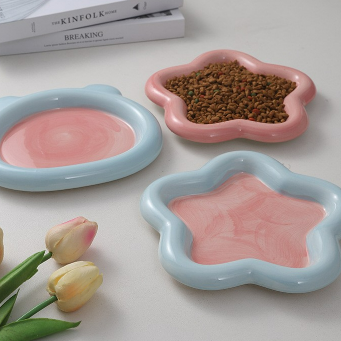 Glazed ceramic pet food plate with bear design in blue and pink, view 2