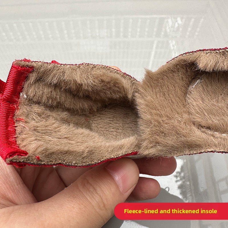 Plush lined winter dog shoes with rubber sole in Black Pair, showing size and shape