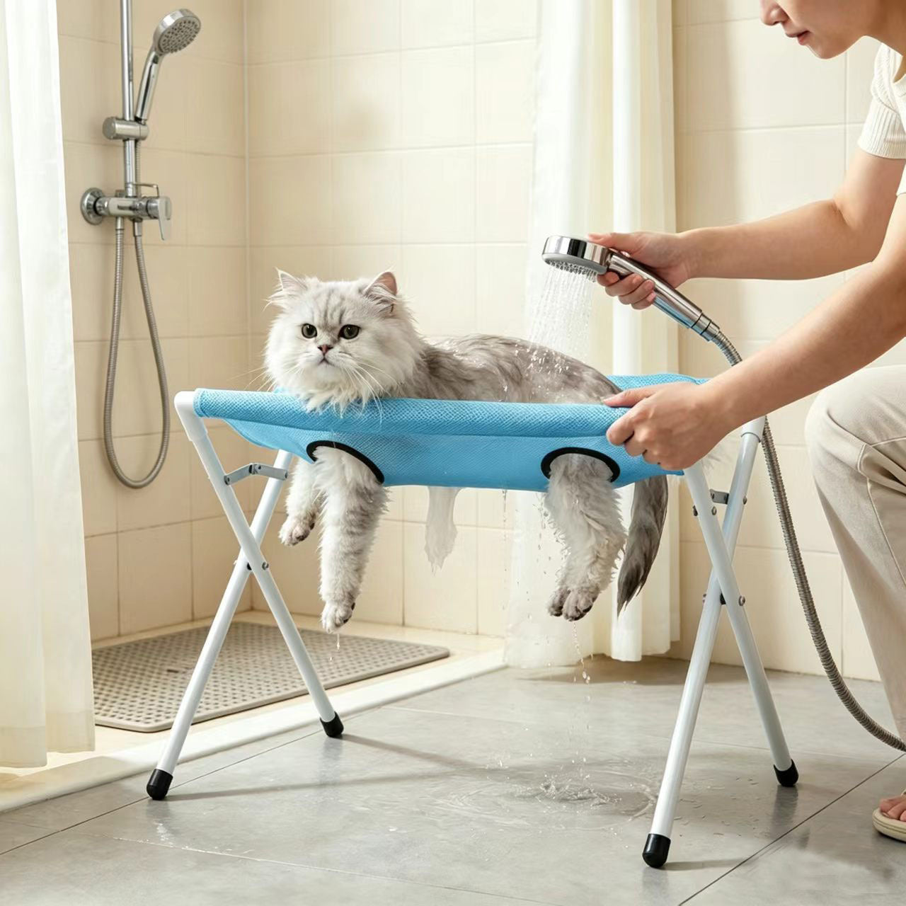 Blue foldable pet grooming hammock stand with non-slip mat