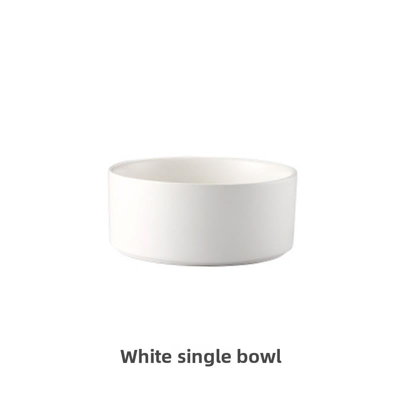 Raised glazed ceramic pet bowl on a stand in pastel yellow, view 30