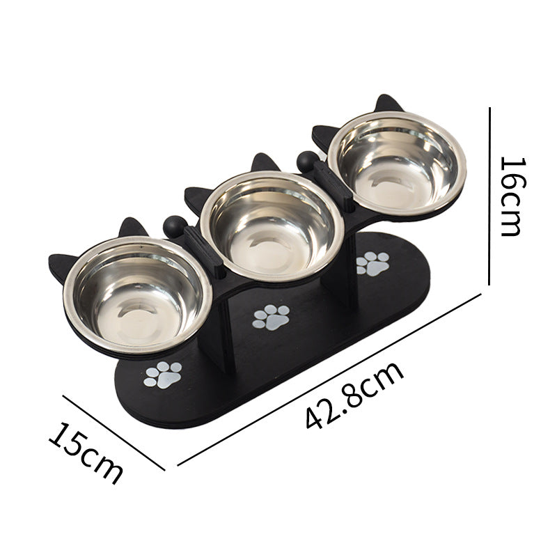 Black raised feeding station holding three pet bowls