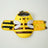 Adjustable dog swim vest with bee print in Dragonfly, close-up detail