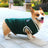 Warm knitted dog vest jumper with pull on design, in use with a pet