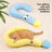 Small dog lying on a yellow pet pillow mat in a living room - photo 2
