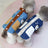 Fleece lined denim pet jacket with panda design in Light Blue Denim, side view