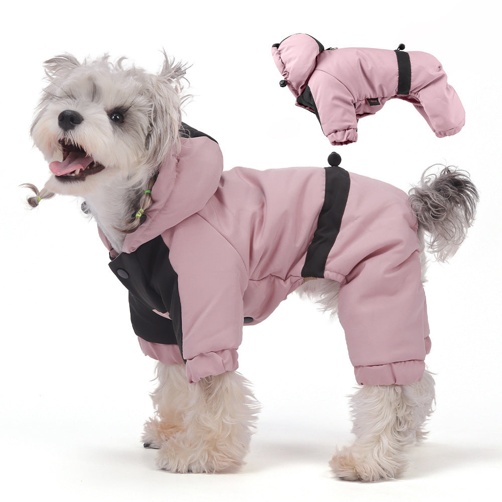 Small dog in a rose pink hooded four leg winter jacket