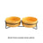 Raised glazed ceramic pet bowl on a stand in pastel yellow, view 6