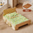 Removable washable pet bed with cute print, close-up detail view