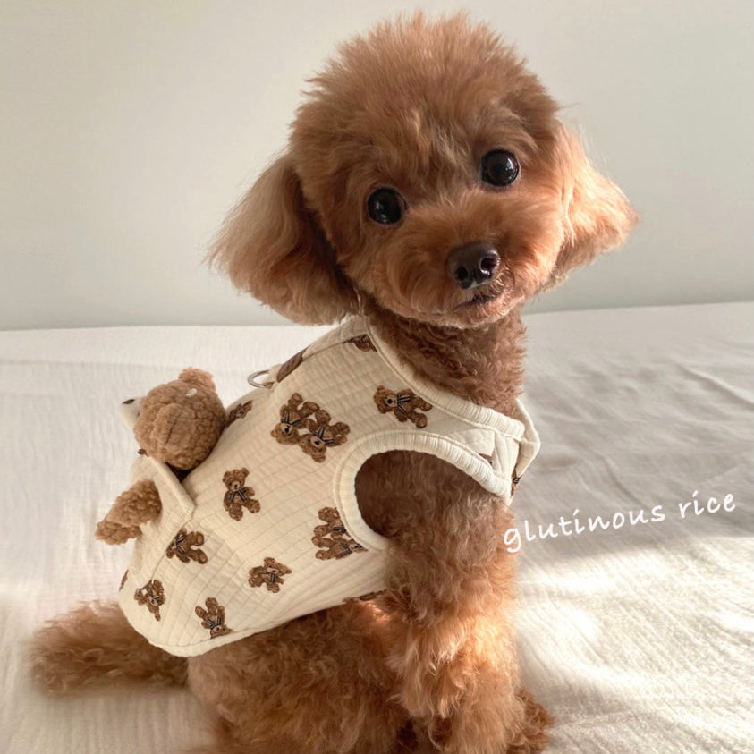 Cotton pet vest with 3D teddy bear pocket in White, in a home setting
