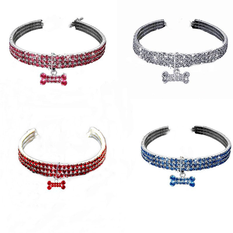 Three row rhinestone elastic collar in pink on a small dog