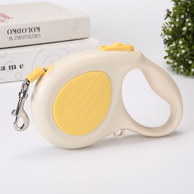 Round cord retractable lead with non slip handle in pink