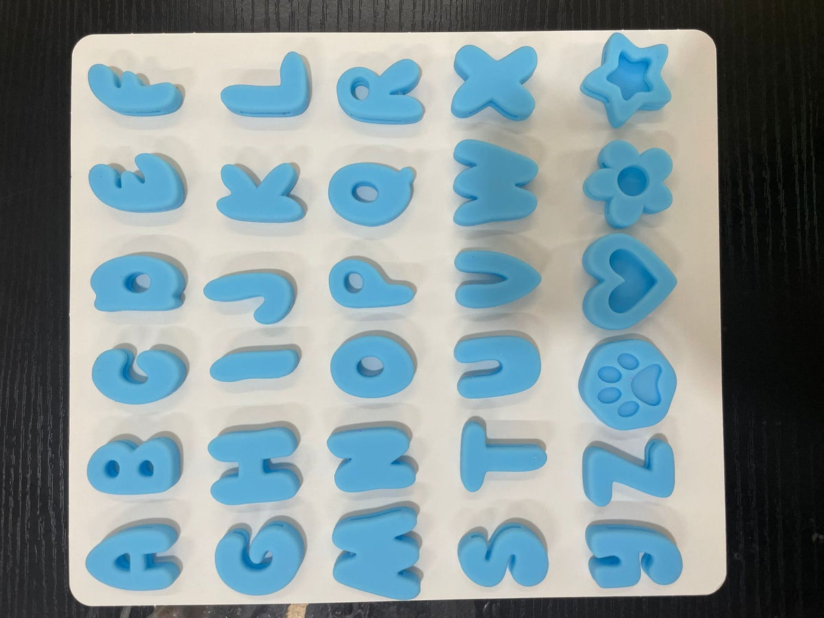 Silicone letter slides for pet collars, close-up detail view