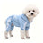 Small dog wearing a red four leg button up hoodie