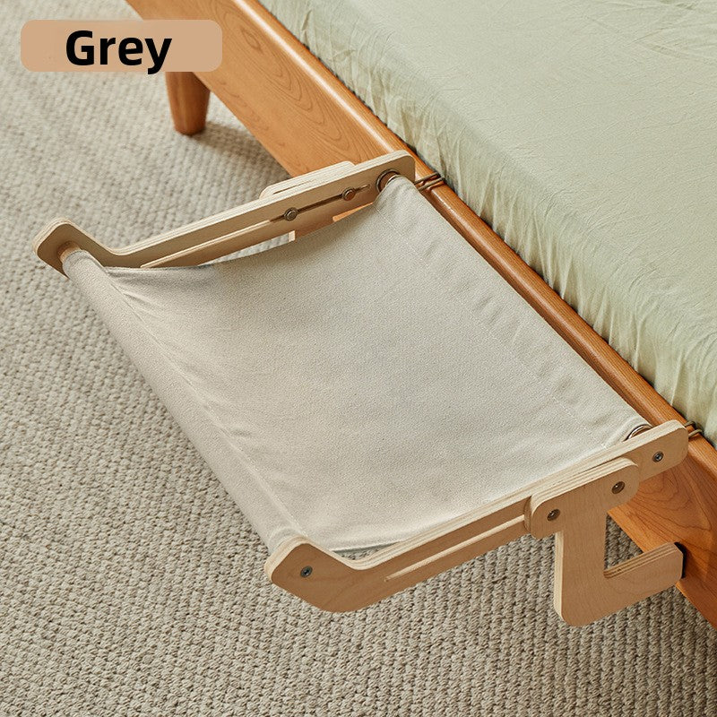 Wooden cat hammock bed hanging on a window