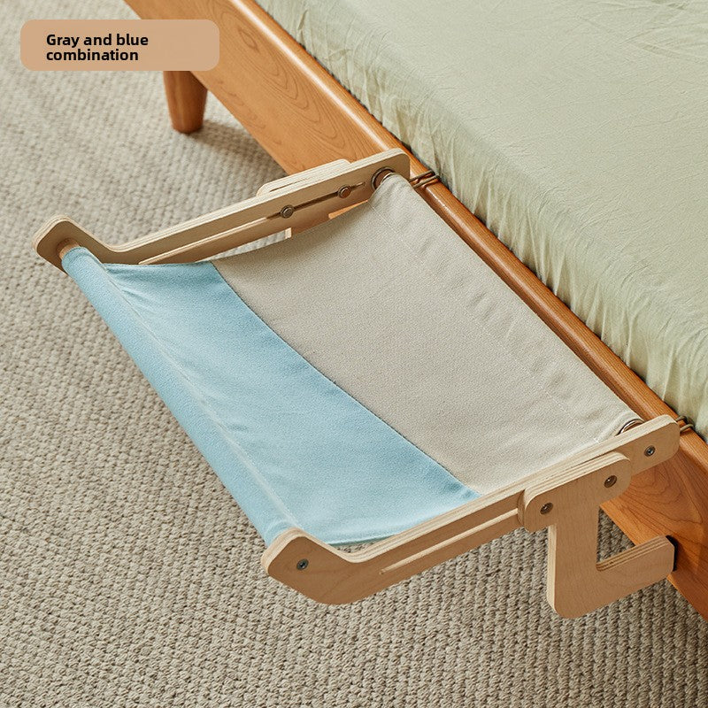 Wooden cat hammock bed hanging on a window
