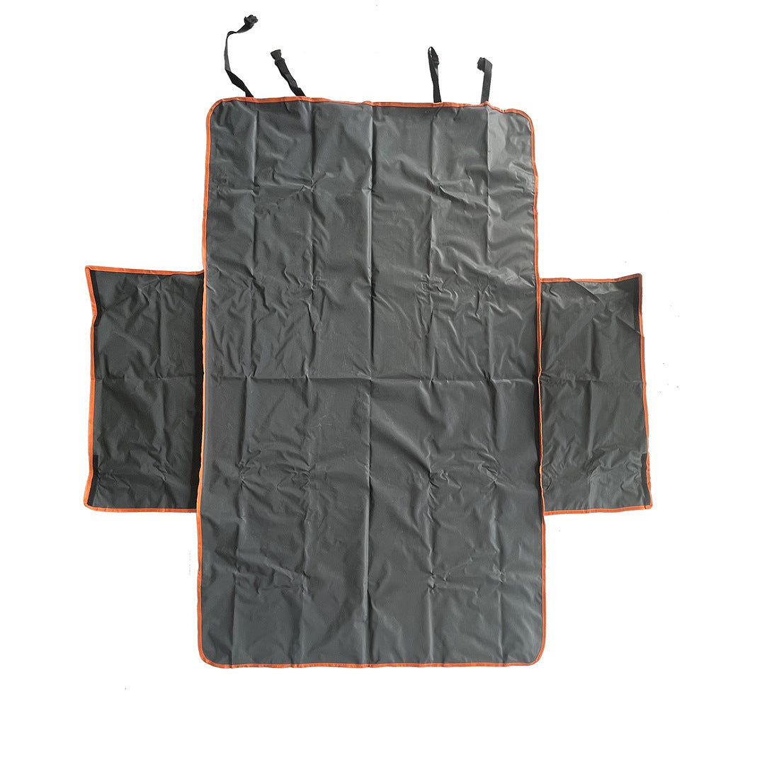 Waterproof dog boot liner with orange edge in a car