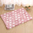 Dog lying on a blue starry sky flannel mat