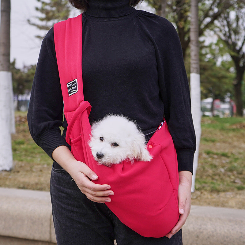 Crossbody cat carrier sling with phone pocket in pink