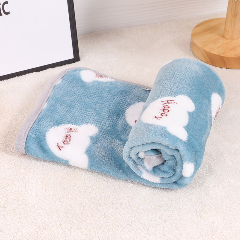 Soft flannel pet blanket with navy paw print