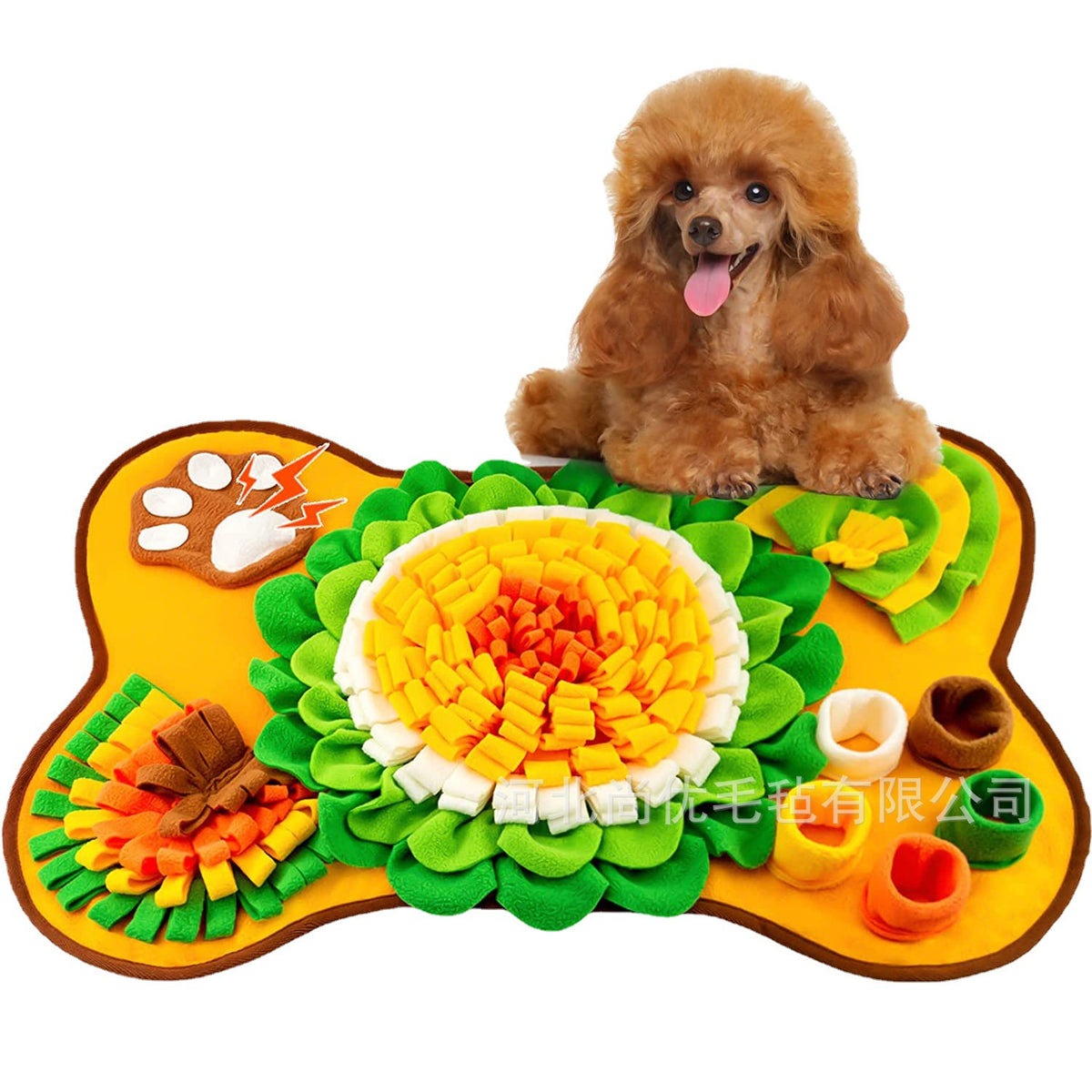 Dog sniffing for treats in a grey snuffle mat