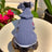 Thick knitted wool jumper for dogs and cats in Royal Blue, in a home setting