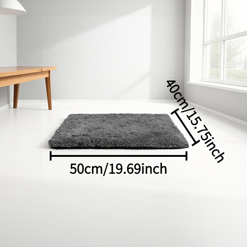 Cat kneading a soft heat-reflective pet bed pad