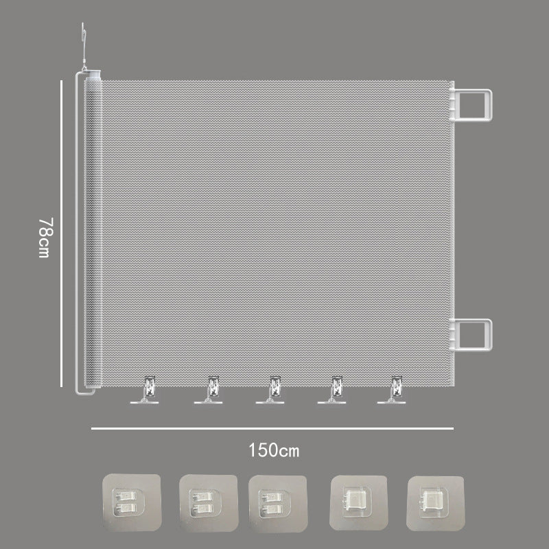 Retractable fabric pet gate across a doorway, photo 8 of 15