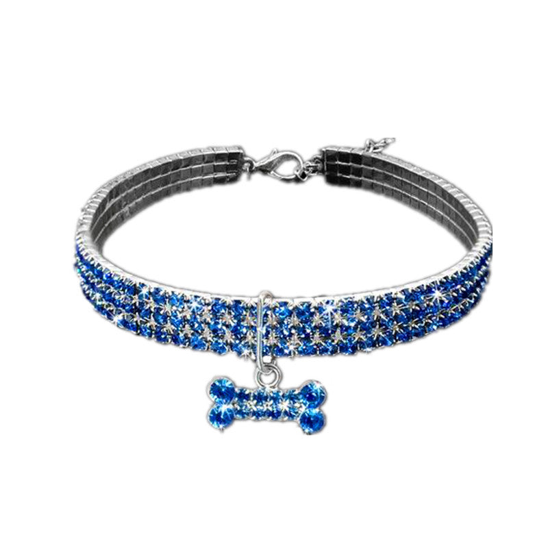 Three row rhinestone elastic collar in pink on a small dog