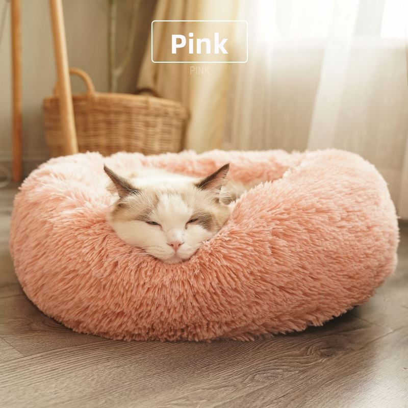 Round plush donut cat bed with raised rim, view 11