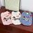 Thick fleece pet vests in white, pink and blue