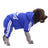 Fleece four-leg dog jumpsuit with button front in Black, in a home setting