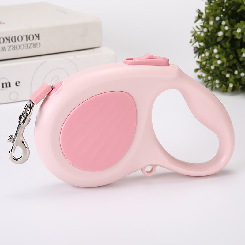 Round cord retractable lead with non slip handle in pink