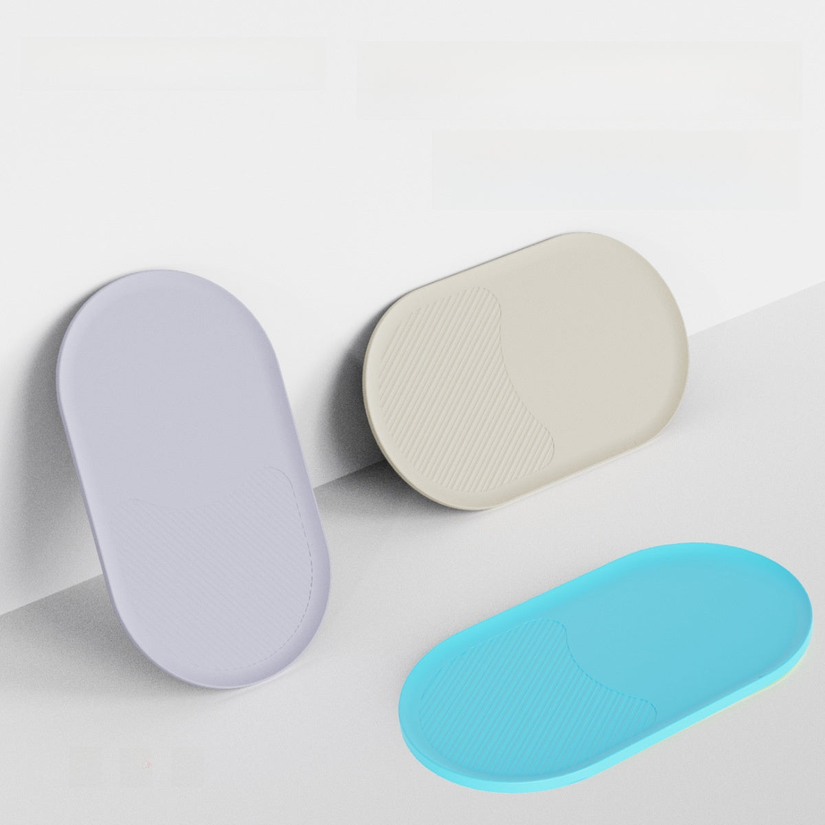 Silicone pet feeding mat with raised edges in cream white